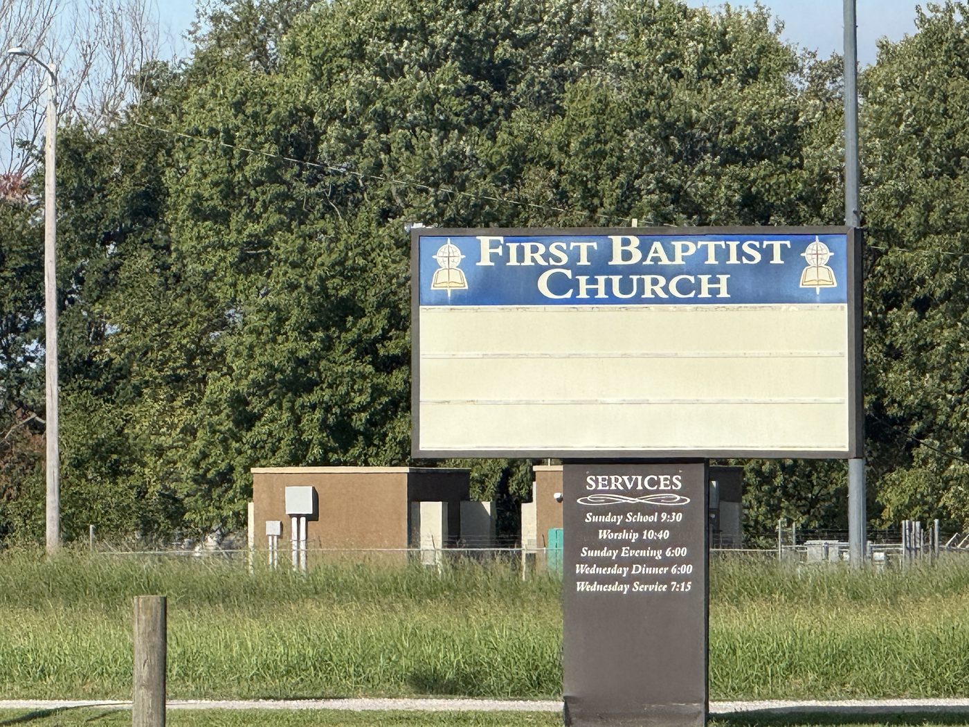 First Baptist Church roadside sign listing service times