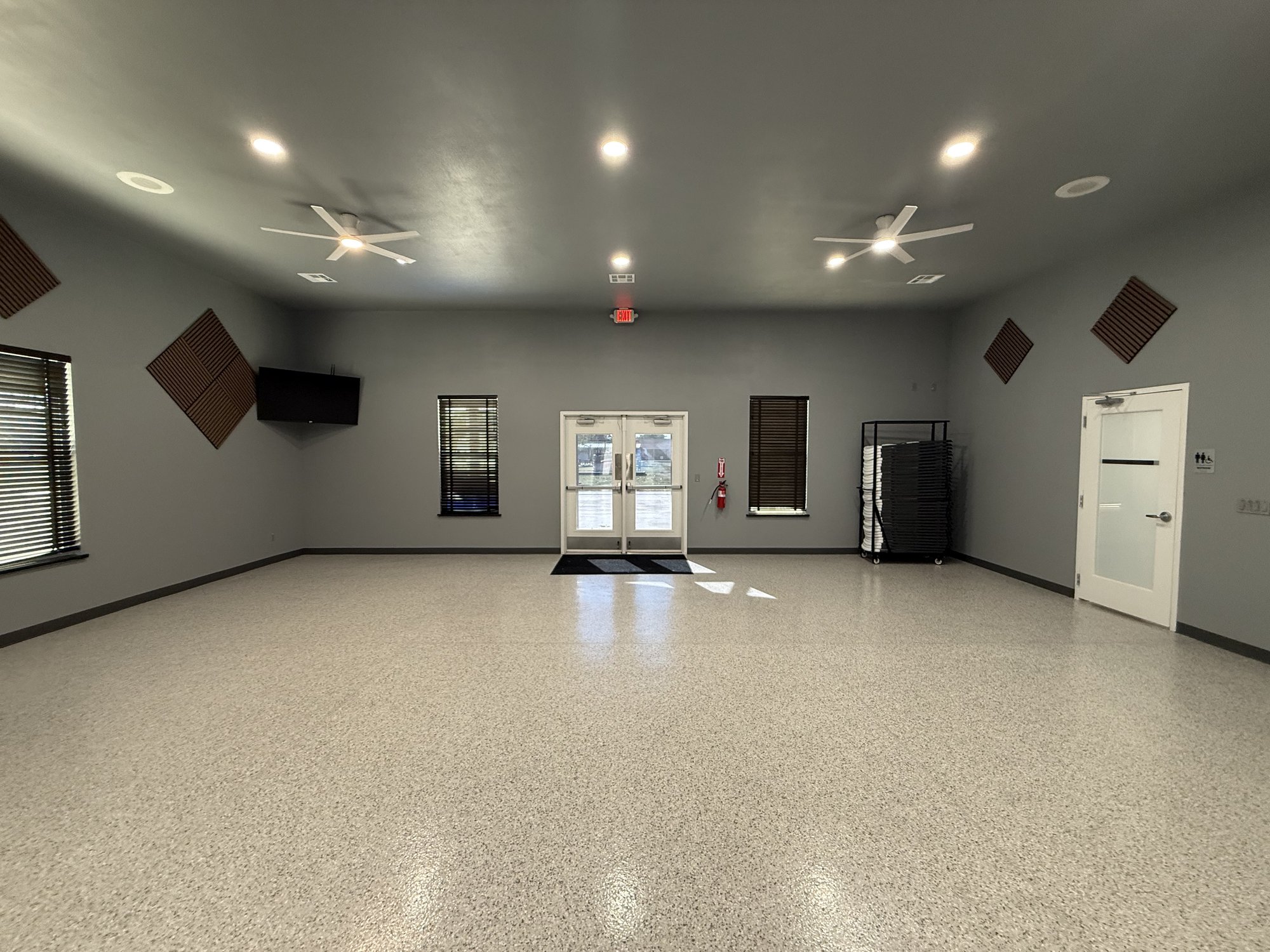 Community Center main hall looking toward the glass entrance doors