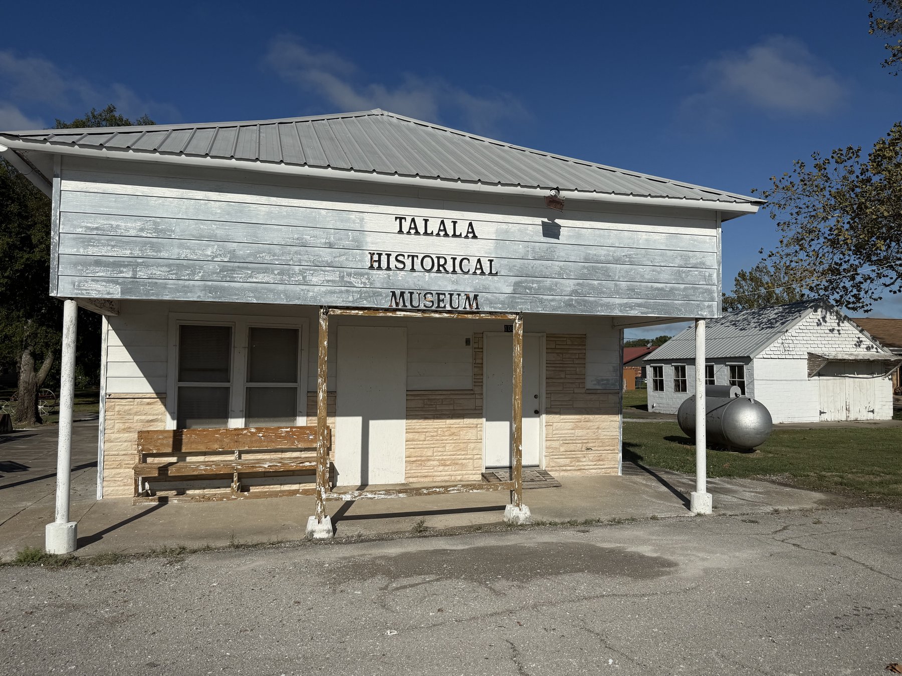 Front of the Talala Historical Museum, a white building lettered TALALA HISTORICAL MUSEUM