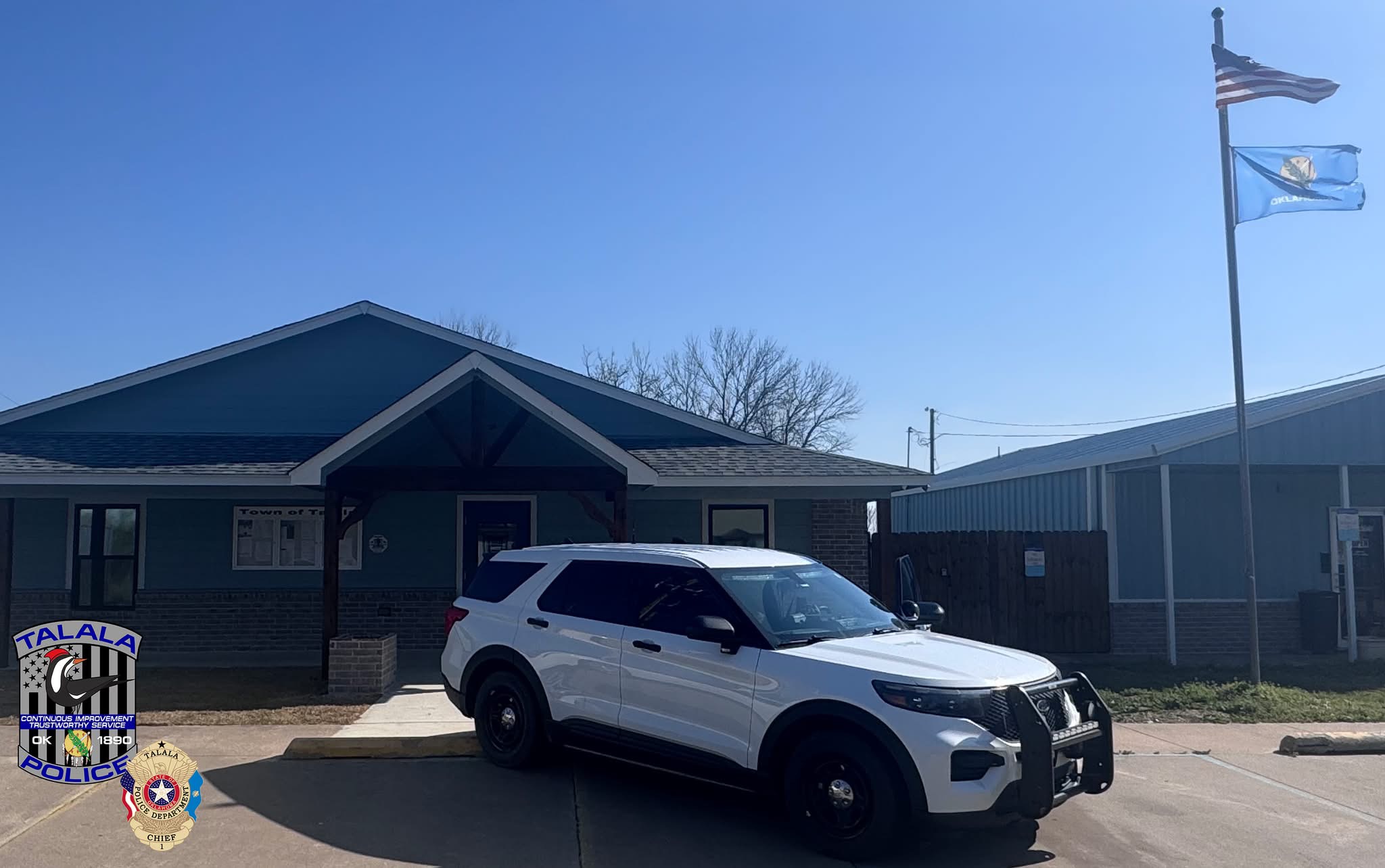 Talala Town Hall with a Talala Police Explorer parked in front